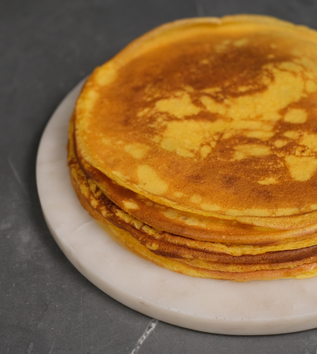 Тонкие тыквенные блинчики: незаменимый рецепт для осеннего угощения